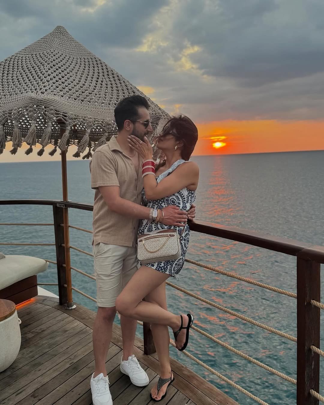 Sunset Balcony Kiss
