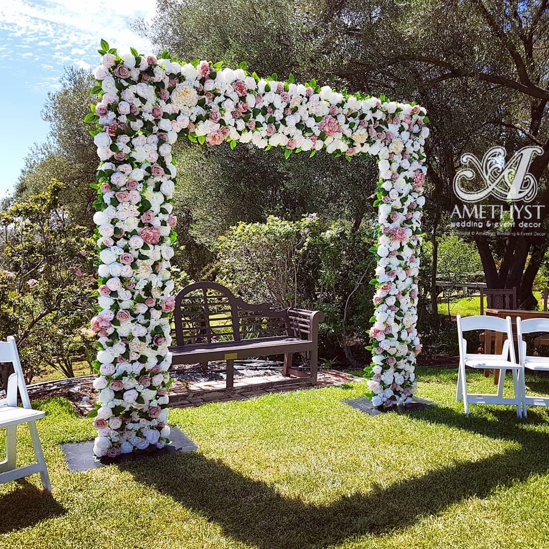 Bloom-Sculpted Ceremony Frame 